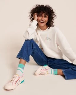 Les Chaussettes Love Runs The World Adulte - Blanc -Bijoux Magasin 23SBasketSupergafemme sweatloverunstheworldfemme chausettescoeur jeanindigo emoiemoi LOOK18 1946web a77cf78a 6976 4784 924e db1403f600d9