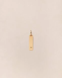 La Médaille Initiale Baguette - Dorée à L'or Fin 24 Carats - 15mm -Bijoux Magasin PERMANENTS BIJOUXDORES MedaillebaguetteinitialeM emoiemoi 168web