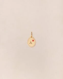 La Médaille Initiale Manoa - Rouge Et Dorée à L'or Fin 24 Carats - 10mm 34 La Médaille Initiale Manoa - Rouge Et Dorée à L'or Fin 24 Carats - 10mm -Bijoux Magasin PERMANENTS BIJOUXROUGES MedailleinitialeManoa10mmA emoiemoi 027web