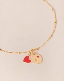 La Médaille Initiale Manoa - Rouge Et Dorée à L'or Fin 24 Carats - 10mm 23 La Médaille Initiale Manoa - Rouge Et Dorée à L'or Fin 24 Carats - 10mm -Bijoux Magasin PERMANENTS COMPOBIJOUX MedailleinitialeManoaA MedailleCoeurManonRouge Chaineboules emoiemoi 1214web